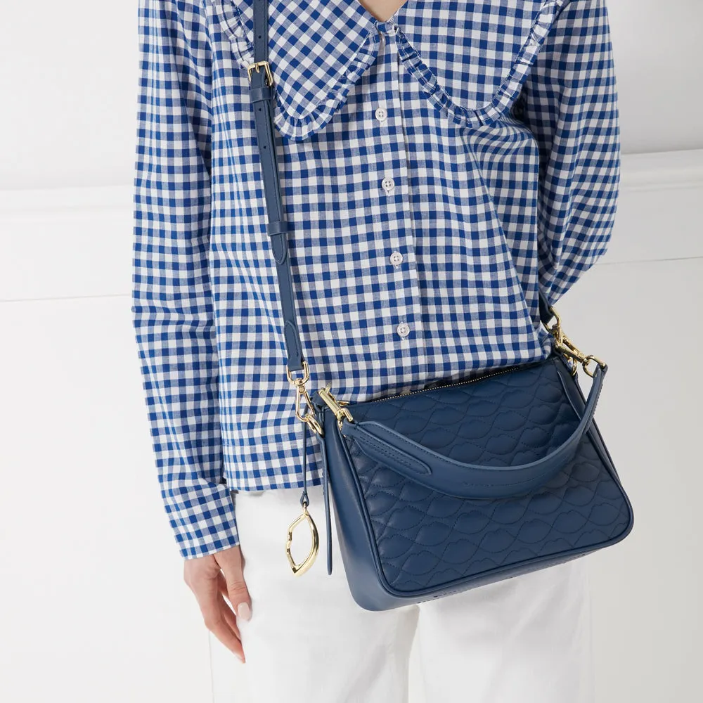 INDIGO QUILTED LIP CALLIE CROSSBODY BAG