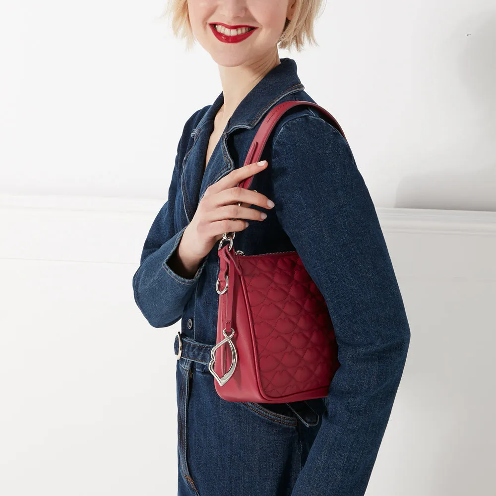 RASPBERRY QUILTED LIP CALLIE CROSSBODY BAG